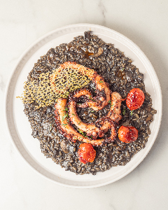 Grigliata de polpo con risotto ai funghi